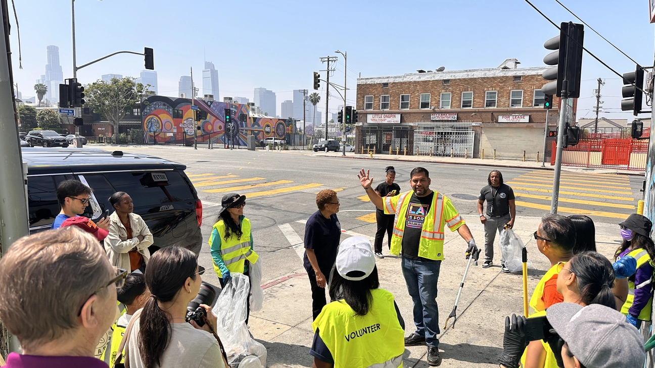 Shine LA Event participants gathered around for instructions on Union Avenue