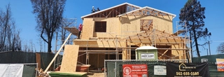 The frame of a home being rebuilt in the Palisades, one of many under construction.